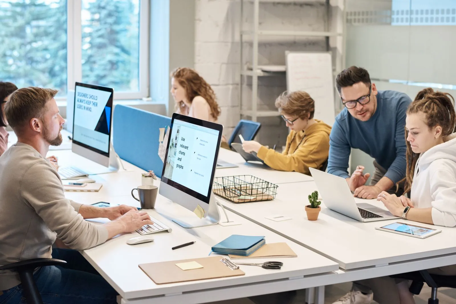 Team working together in a bright office